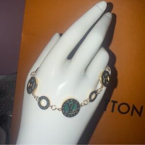 Gold-Tone Green and Black Logo Disc Bracelet - Designer Style